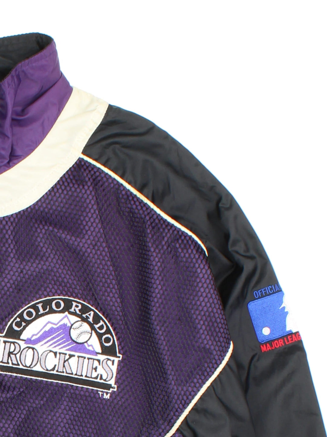 90s Pro Player Colorado Rockies MLB zip-through windbreaker jacket in purple with black and white panelling, two pockets, a branded 'P' zip pull, and embroidered logos on the front, back, and sleeves.