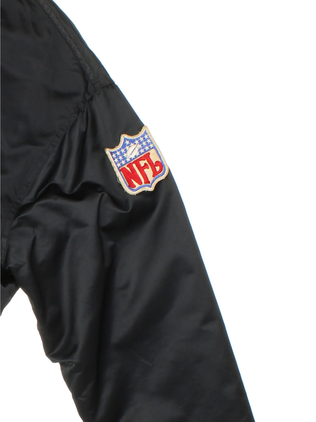 80s Los Angeles Raiders NFL Starter jacket in black with snap closure, two pockets, and embroidered team and NFL logos on the front, back, and sleeve.