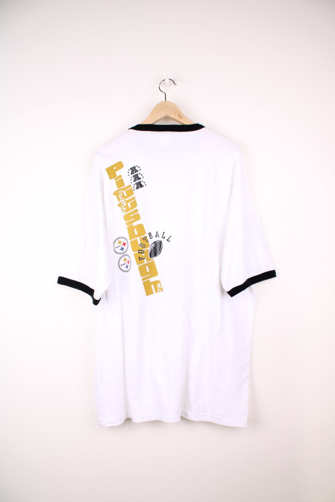 Vintage Pittsburgh Steelers T-Shirt by Lee Sport with large print on the front and back. 