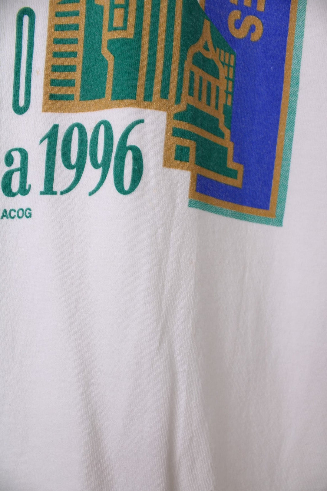 Atlanta 1996 Centennial Olympic Games single stitch T-Shirt. Features large graphic print on the front. 