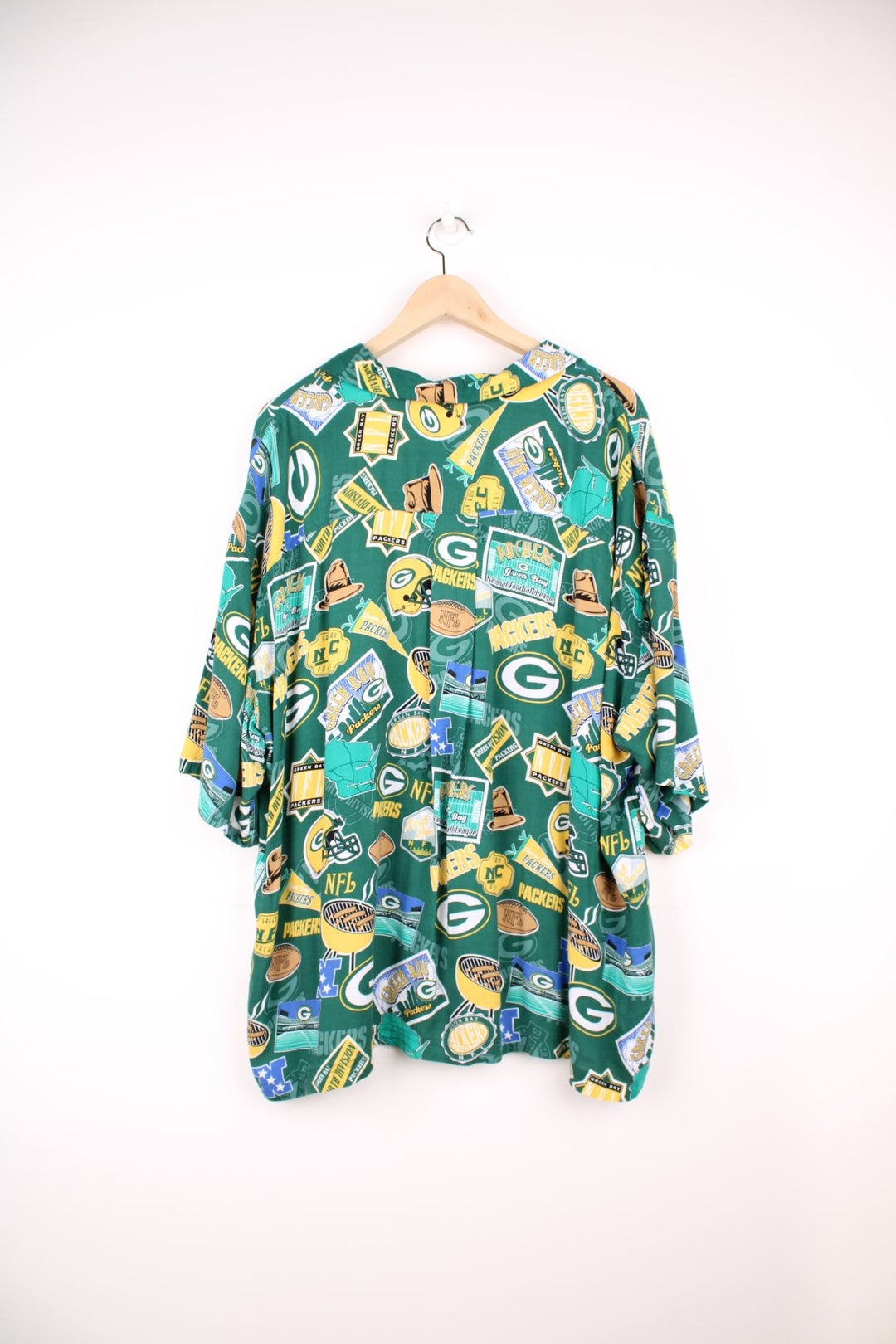 Green Bay Packers button up shirt with all over print. 