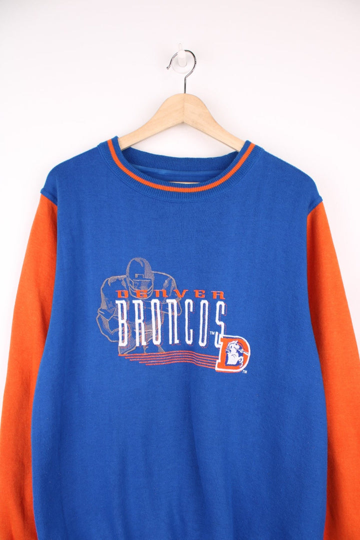 Denver Broncos sweatshirt in blue and orange with embroidered logo across the chest.