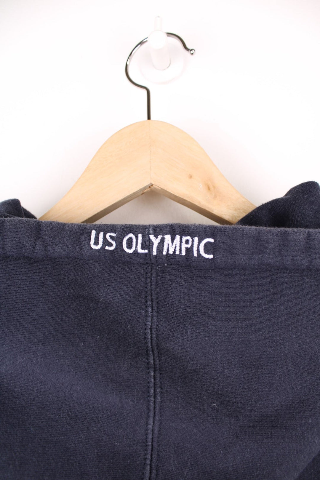 Team USA blue zip through hoodie with red embroidered "USA" across the chest and olympic rings on the sleeve.