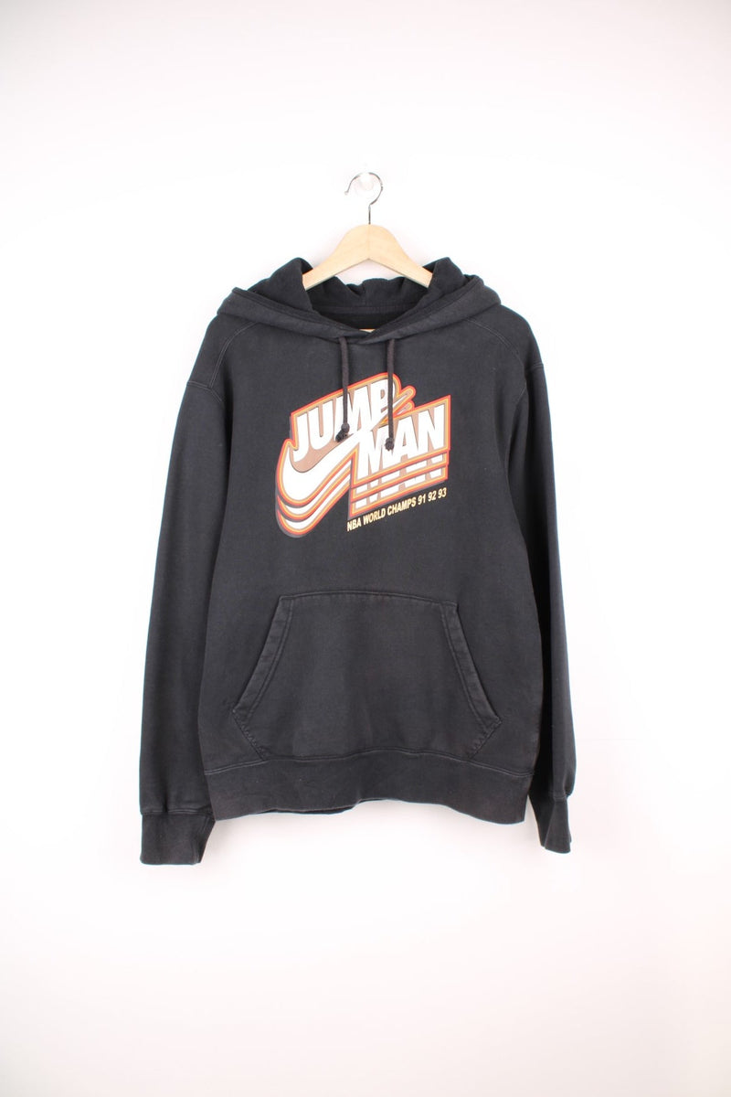 Nike Air Jordan Jumpman, NBA World Champs pullover hoodie in black with fleece lining. 