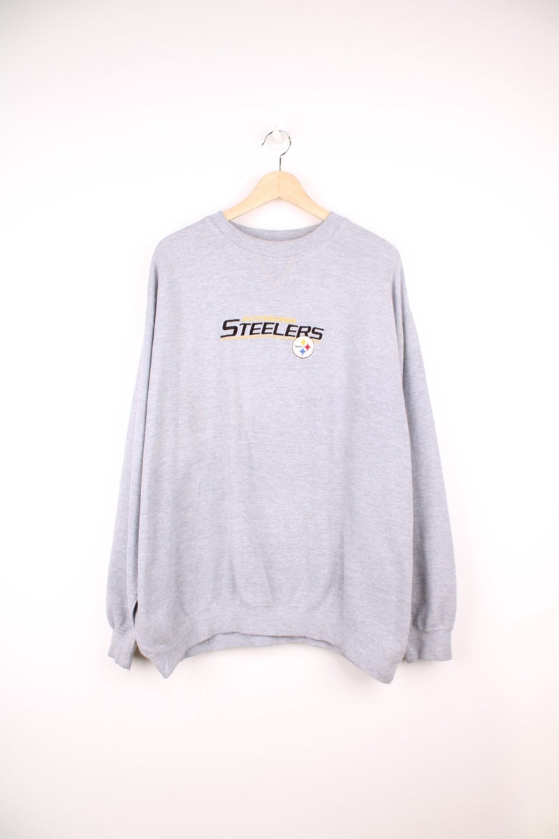 Vintage Pittsburgh Steelers sweatshirt with embroidered logo across the chest.