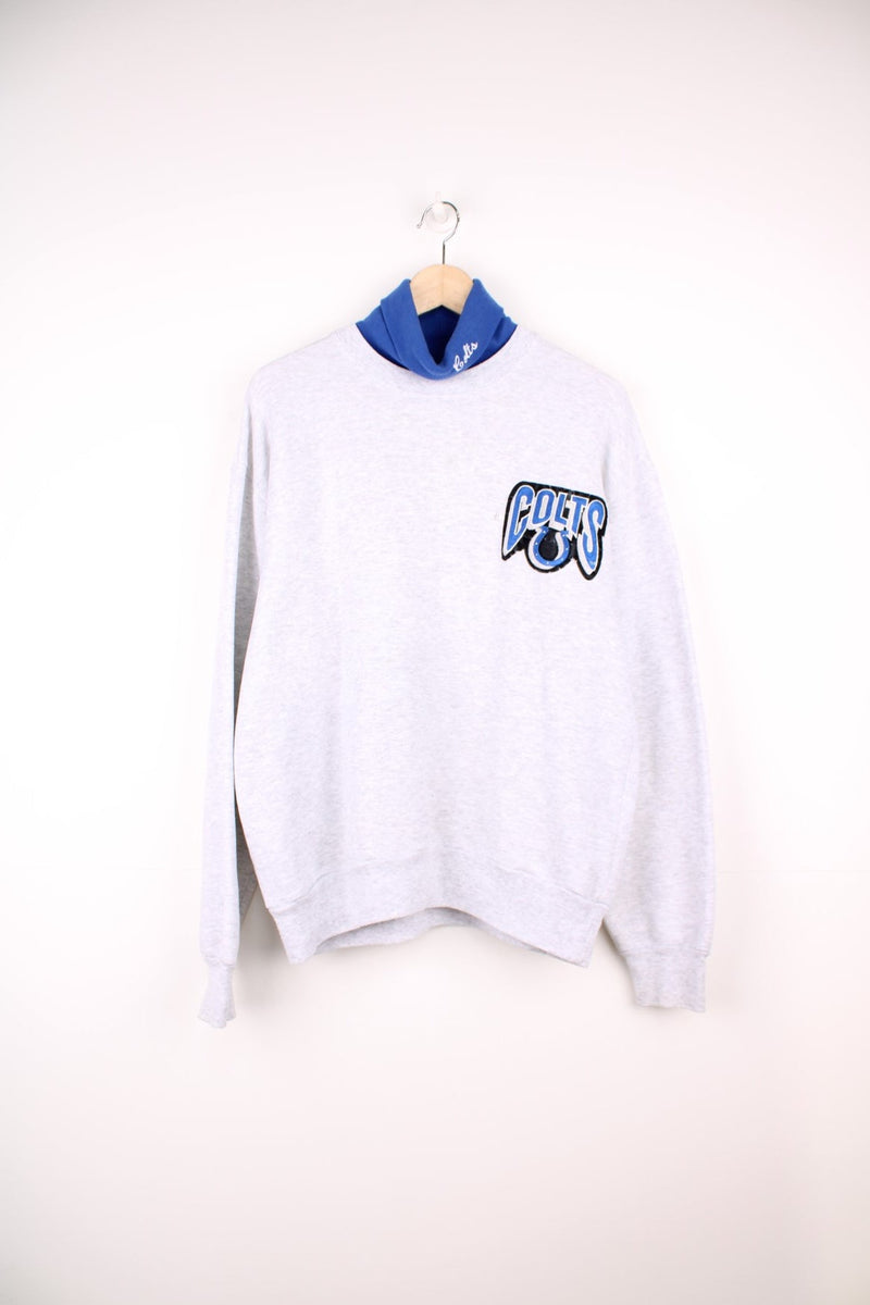 Grey and blue Indianapolis colts sweatshirt with embroidered logo on the chest and turtleneck. 