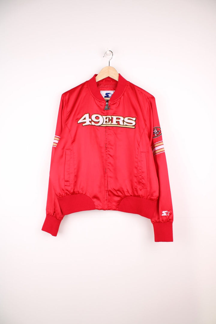 San Francisco 49ers satin zip through bomber jacket with embroidered logo across the chest.