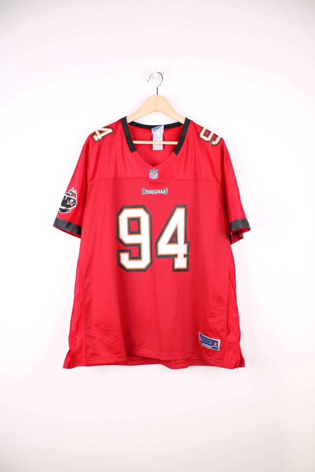 NFL Tampa Bay Buccaneers Shirt in a red colourway, Adrian Clayborn number 94 printed on the back, and has the logos printed on the front. 