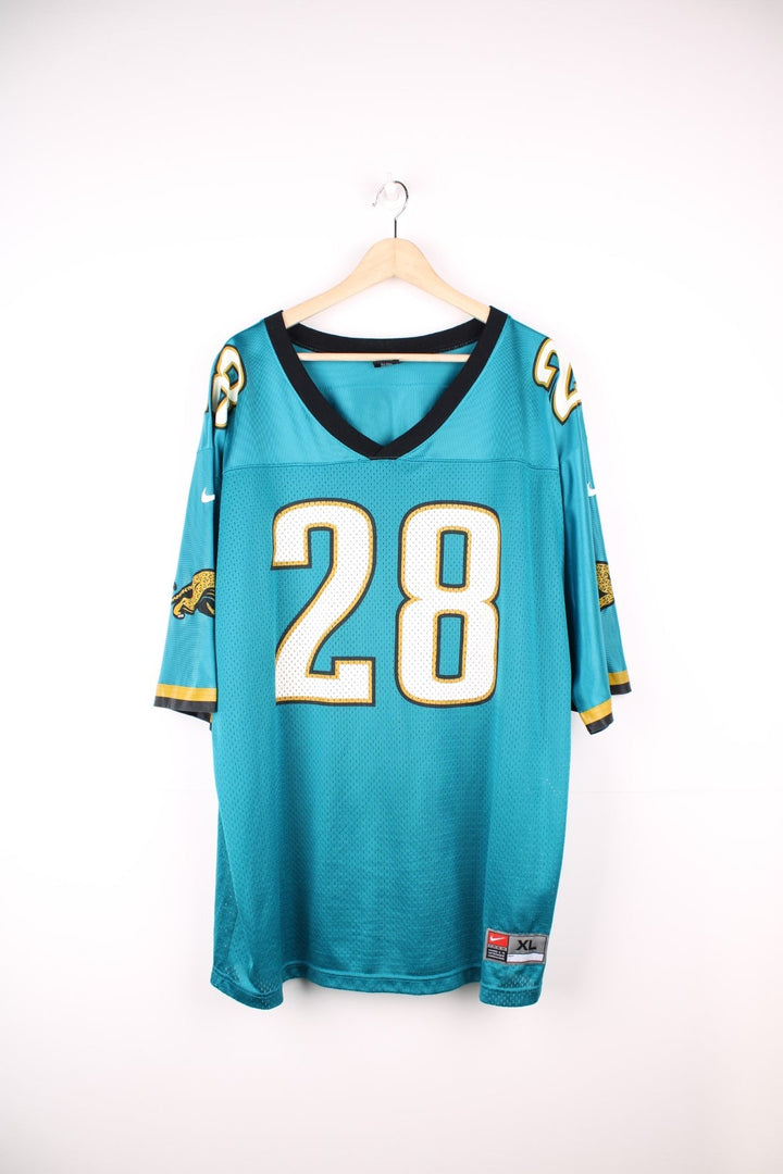 Jacksonville Jaquars Nike Jersey in a blue, white, and black colourway, Fred Taylor number 28 printed on the back, and has the logos printed on the sleeves. 