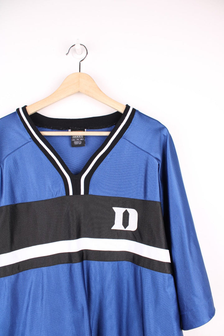 Nike Duke Blue Devils University Basketball Training Top in a blue, black and white colourway, v neck and has the logo embroidered on the front. 