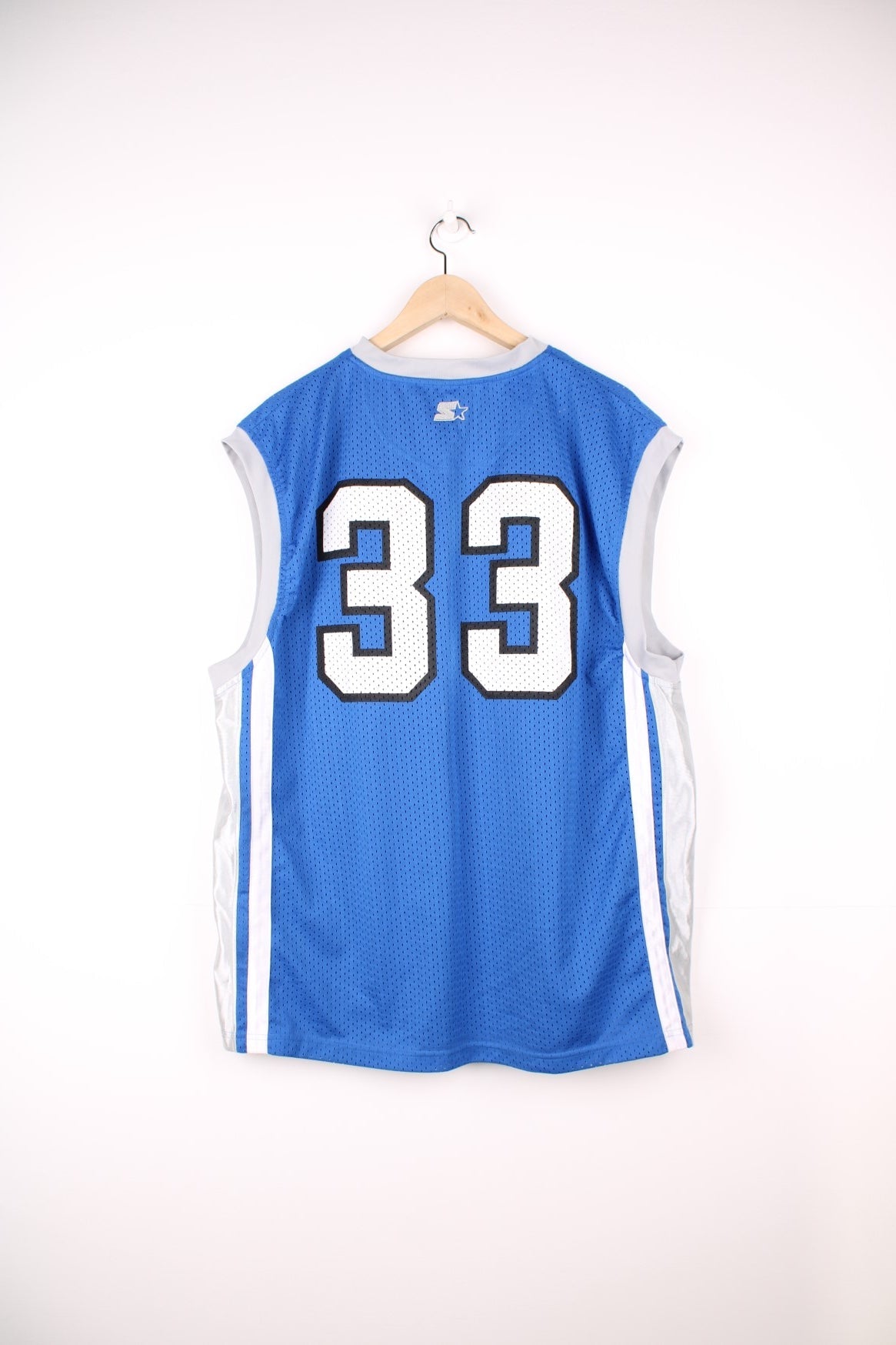 Kentucky Wildcats University Basketball Jersey in a blue and white colourway, number 33 printed on the back and has the spell out logo printed on the front.