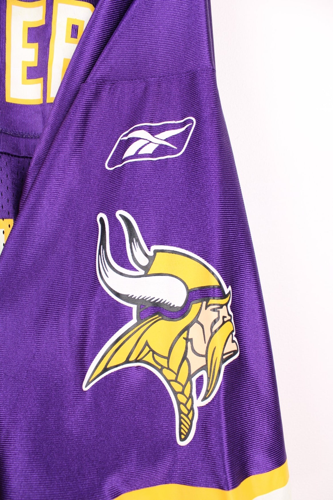 NFL Minnesota Vikings Jersey in a purple colourway, Duante Culpepper number 11 printed on the back, and has the logos printed on the front and sleeves. 