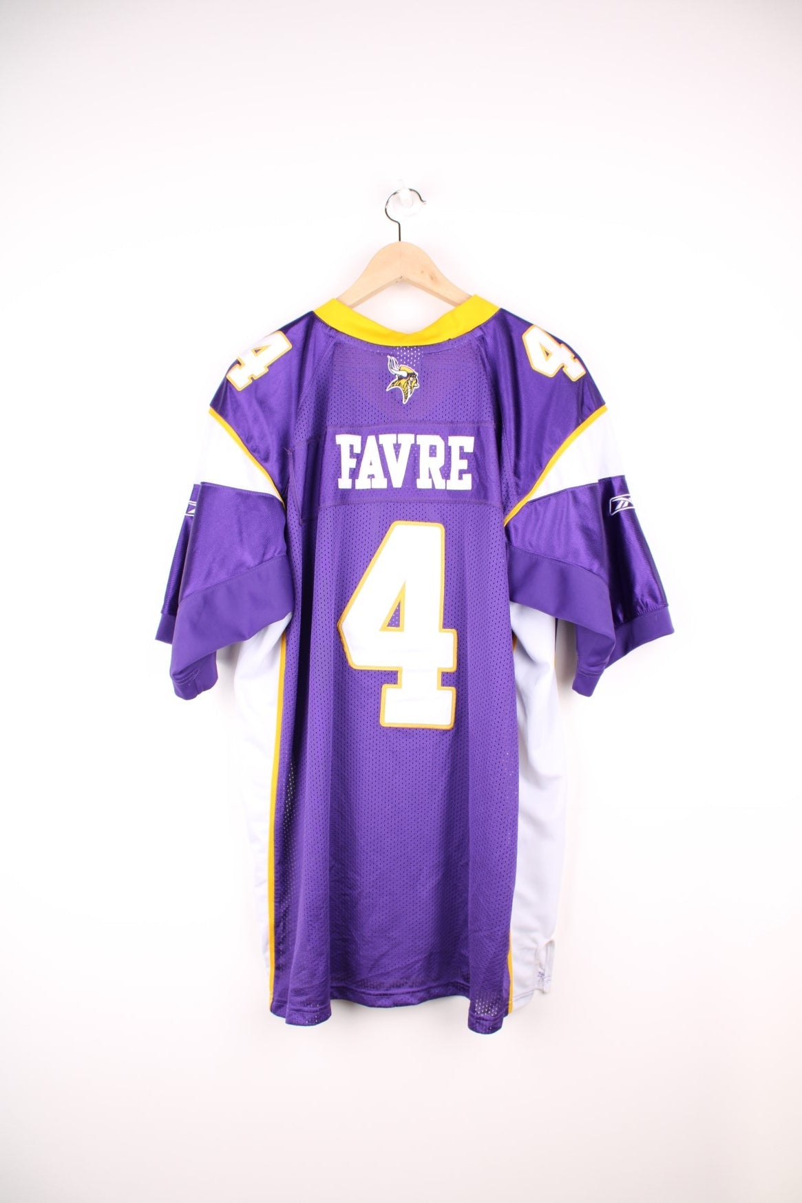 NFL Minnesota Vikings Jersey in a purple colourway, Brett Favre number 4 embroidered on the back, and has the logos on the front and sleeves. 