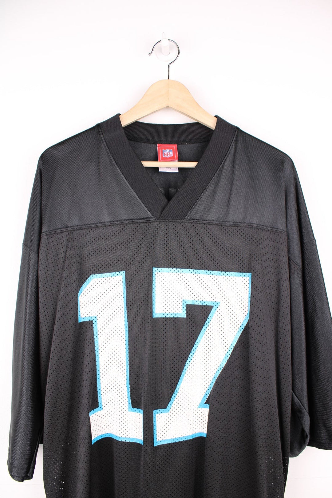 NFL Carolina Panthers Super Bowl 2004 Jersey in a black colourway, Jake Delhomme number 17 printed on the back, and has the logos on the sleeves. 