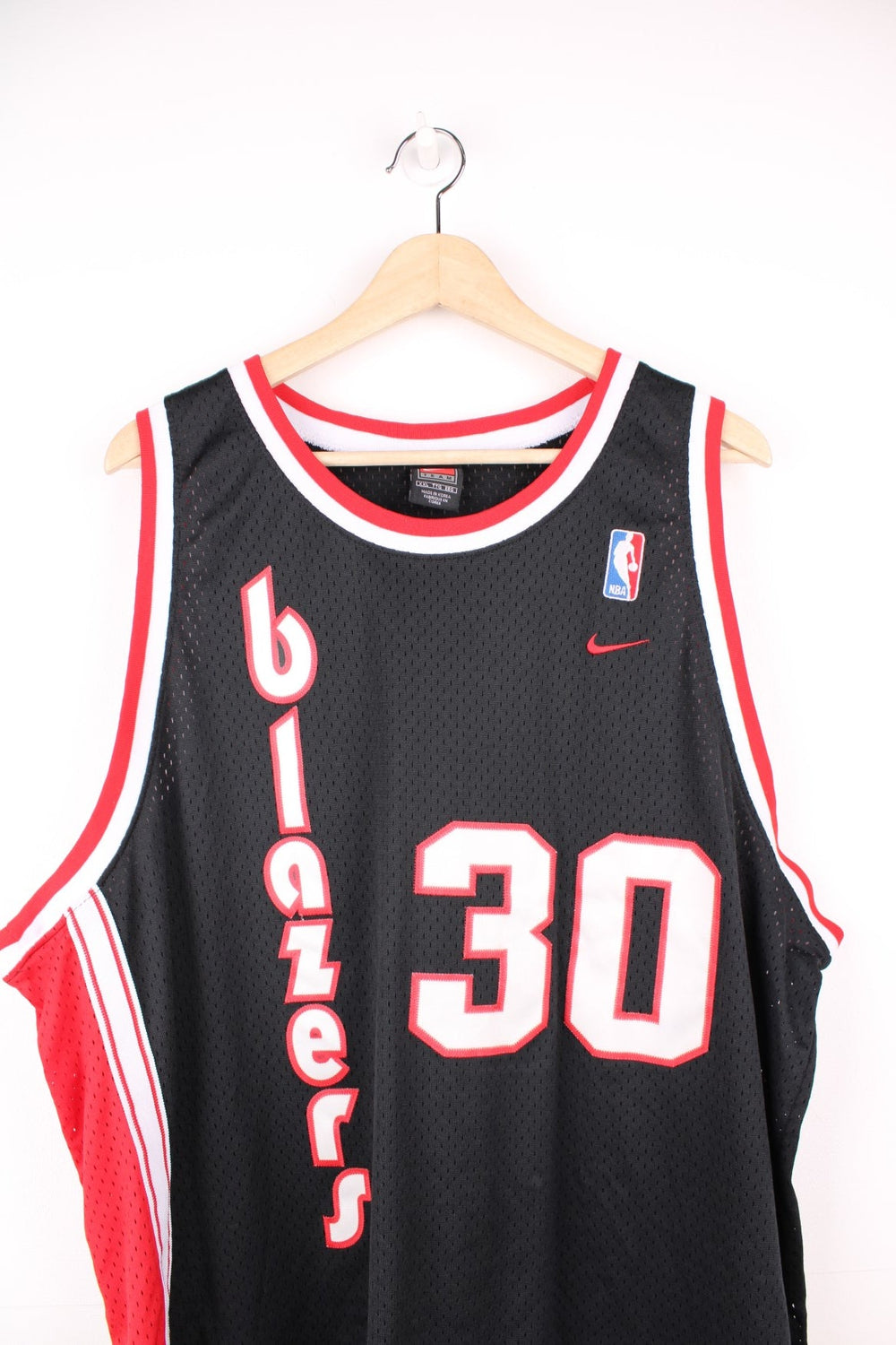 Nike 2000's Portland Trail Blazers NBA Jersey in a black, red and white colourway, Rasheed Wallace number 30 embroidered on the back, and has the logos embroidered on the front.  