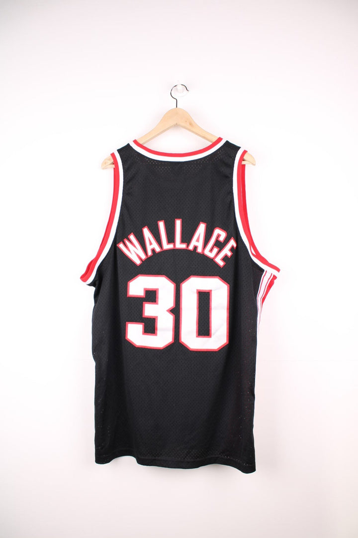 Nike 2000's Portland Trail Blazers NBA Jersey in a black, red and white colourway, Rasheed Wallace number 30 embroidered on the back, and has the logos embroidered on the front.  