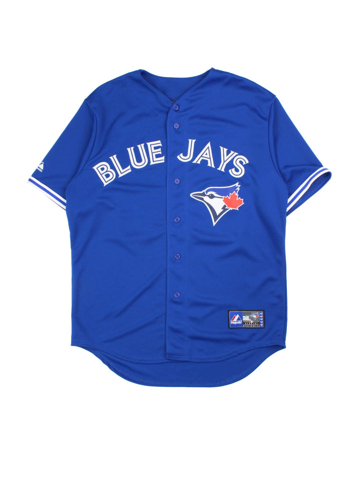 Toronto Blue Jays Romero MLB Jersey in the blue home kit colourway, features embroidered logos and badge on the front, and Romero number 24 on the back.