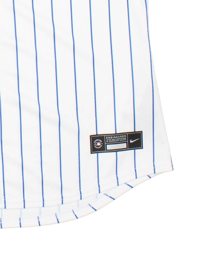 Chicago Cubs Nike MLB Jersey in the white colourway, logo embroidered on the chest with blue stripe detailing. World tour London series badge on sleeve.