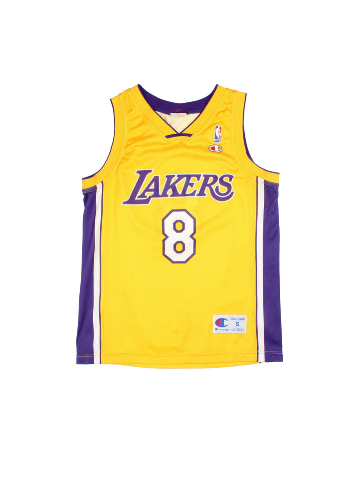 Los Angeles Lakers Champion NBA Jersey in the yellow home kit colourway, features classic logo across chest and Kobe Bryant player name on and numbe on the back.