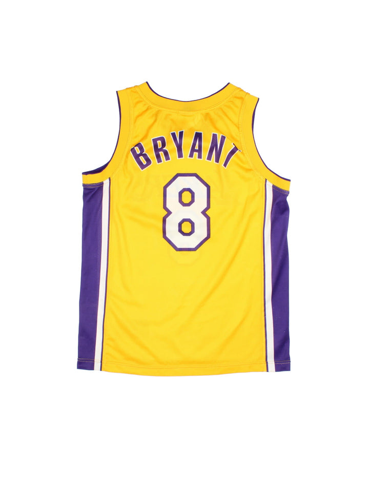 Los Angeles Lakers Champion NBA Jersey in the yellow home kit colourway, features classic logo across chest and Kobe Bryant player name on and numbe on the back.