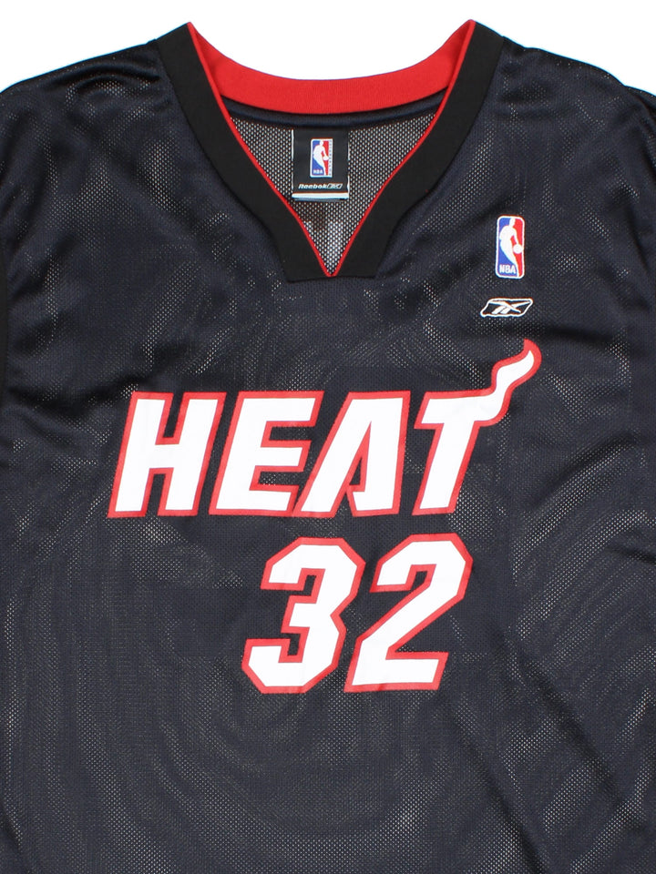 Miami Heat Reebok NBA Jersey in the black away kit colourway with red detailing. #32 Shaq O'Neal on the back with the team logo on front