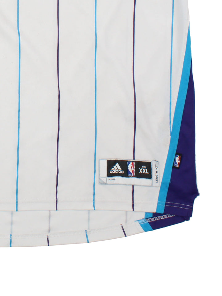 New Orleans Hornets Adidas  Chris Paul #3 NBA Jersey in the white colourway, features embroidered logo, badge and player name and number.