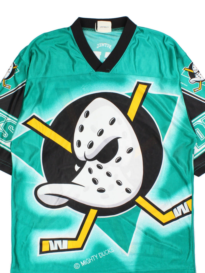 Vintage Nutmeg Mighty Ducks NHL Jersey in the green colourway, features large logo graphic on front and back with smaller logo on sleeves.