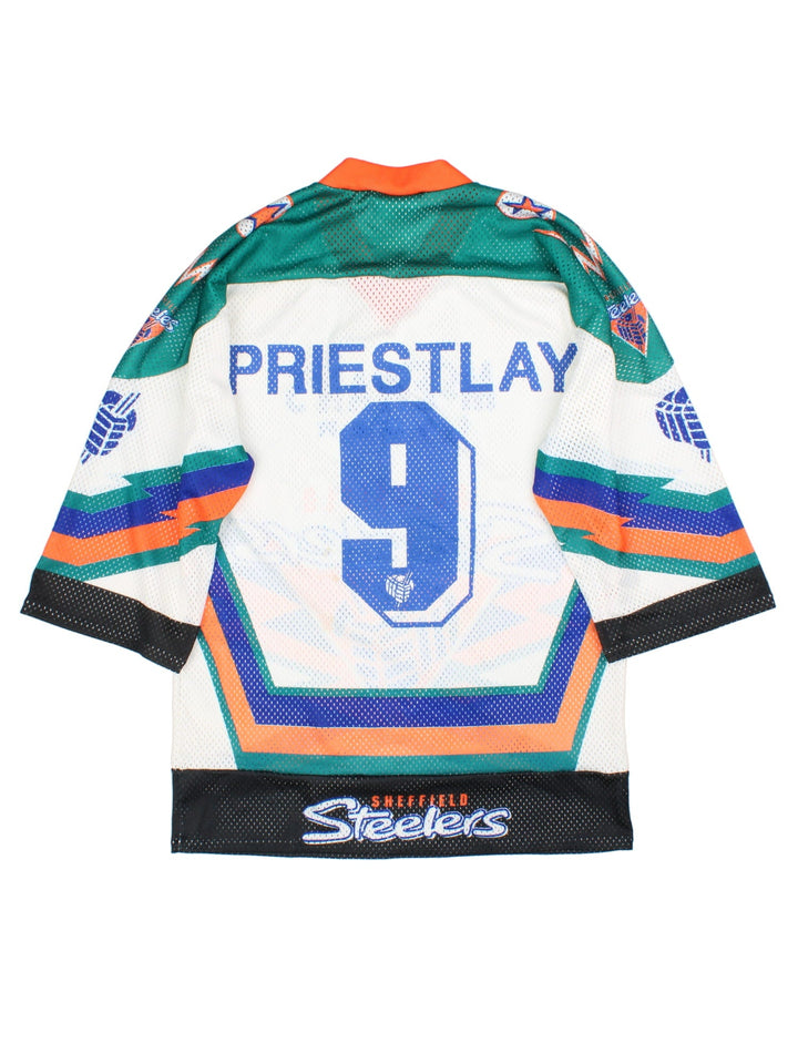 Vintage Sheffield Steelers Ice Hockey Jersey in the white colourway, features large logo and graphic and badge on the front. Two vintage 90's badge pins attached to collar and player name and number on back.