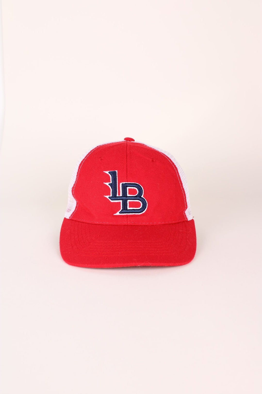 Vintage Louisville Bats Baseball cap in red and white with adjustable strap at the back.