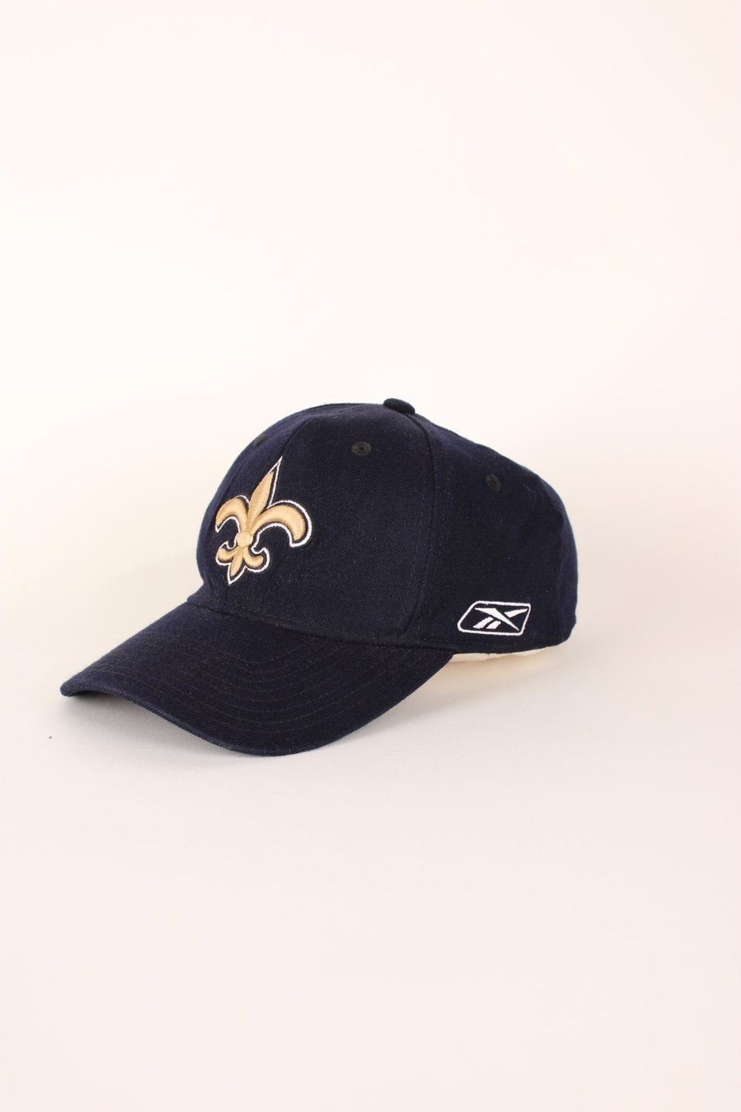 NFL New Orleans Saints Reebok Baseball Cap in navy blue with embroidered logo.