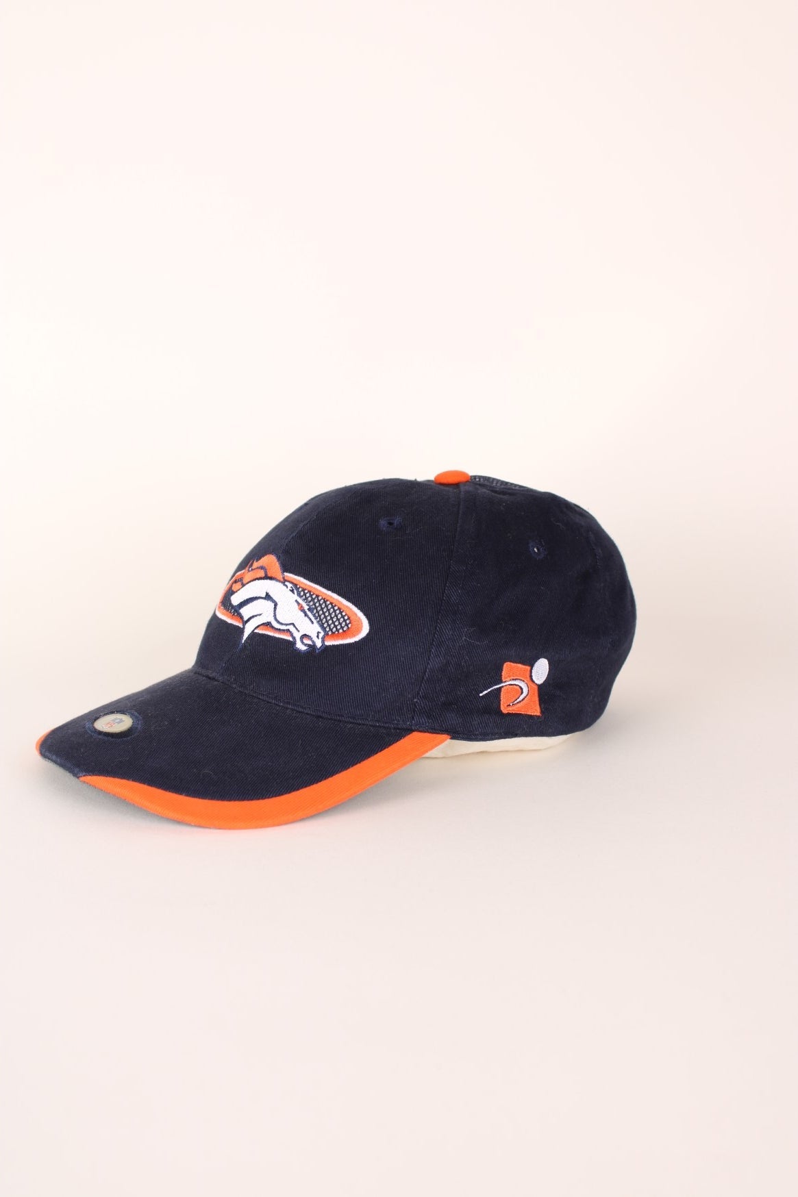 NFL Denver Broncos baseball cap in navy blue and orange with embroidered logo and adjustable velcro strap. 