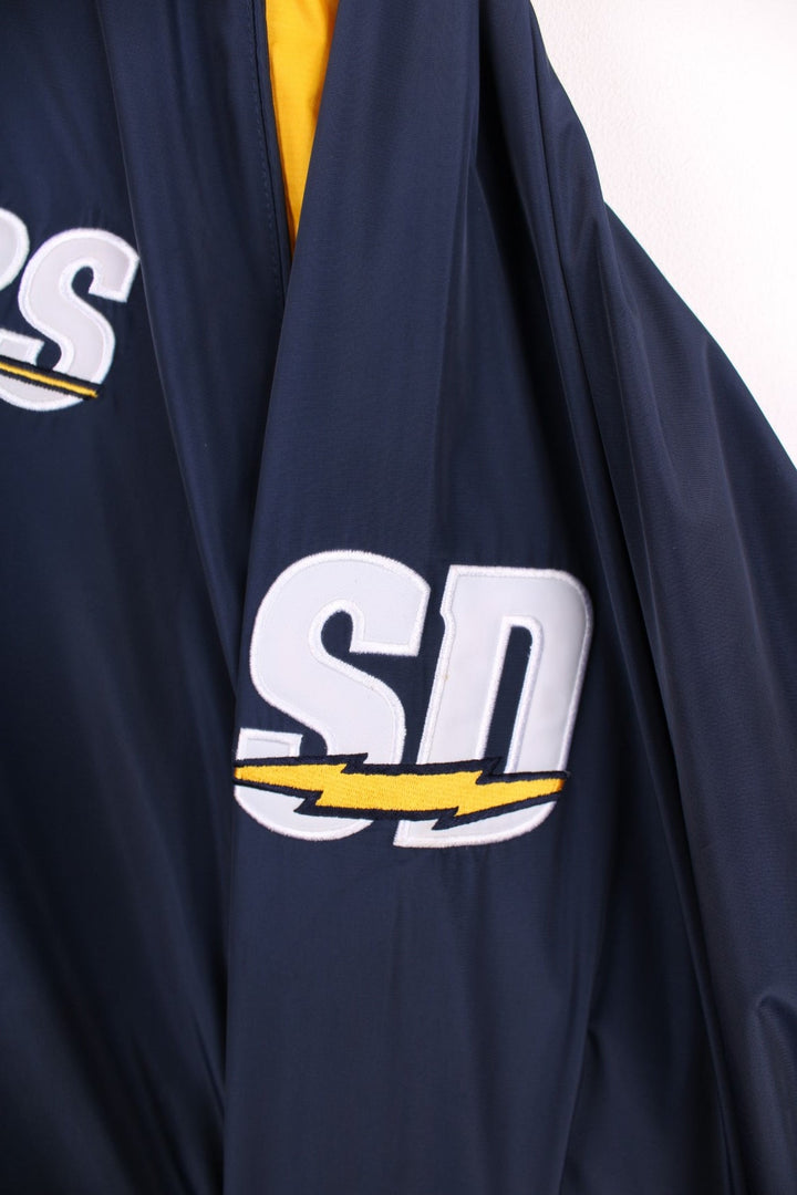 Chargers NFL drill top in a navy colourway with yellow side panels. Chargers logo on front and back and NFL logo on front.