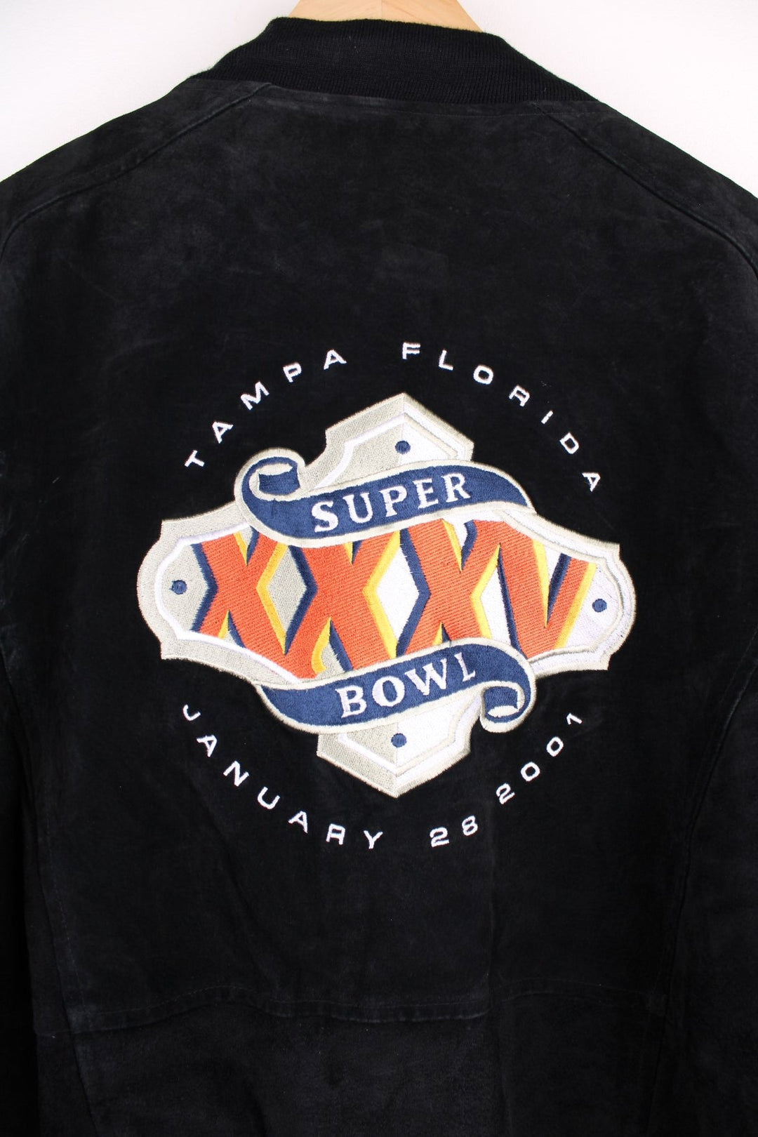 Vintage Jeff Hamilton, Super Bowl 2001, bomber jacket that features a heavyweight suede outer with a thick quilted inner lining, embroidered with a graphic on the front and spell-out Super bowl 2001.