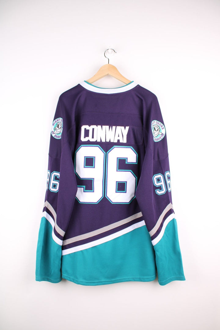 Anaheim Mighty Ducks NHL jersey in purple with blue and white stripe accents, features embroidered logos and no.96 Conway on the back.