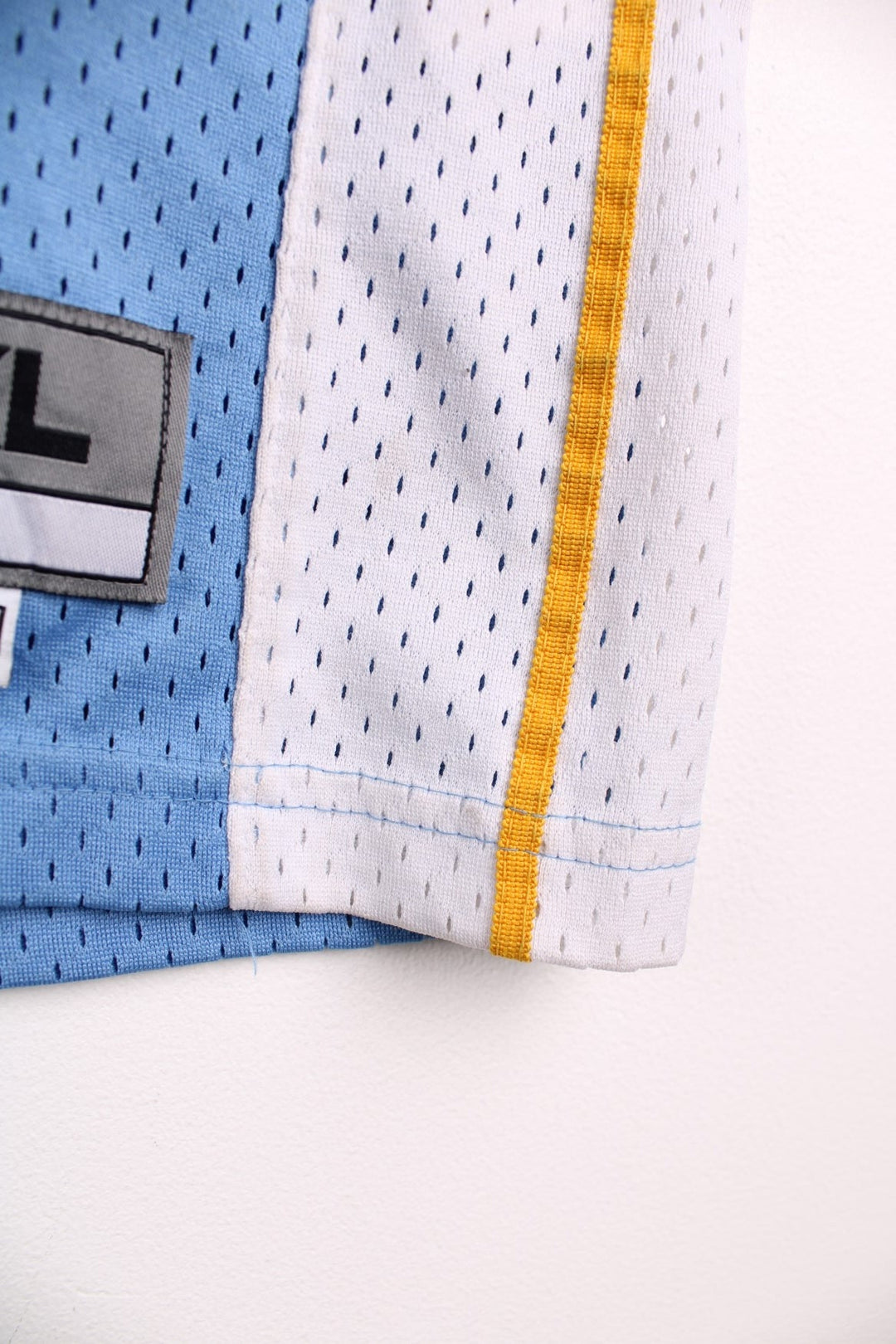 Denver Nuggets NBA in blue with yellow and white accents, multiple embroidered logos and no.15 Anthony on the back.