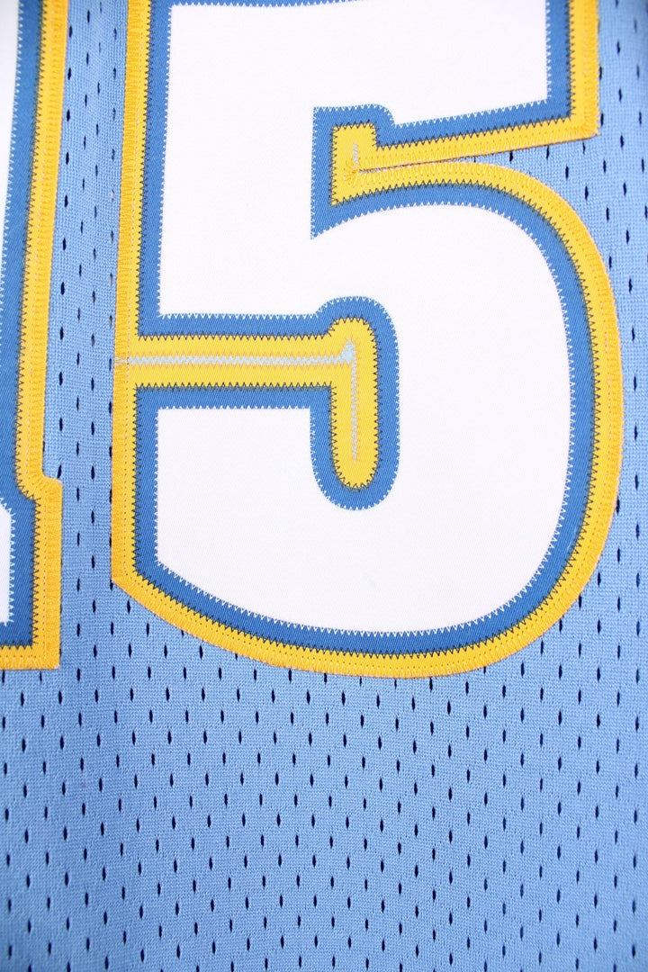 Denver Nuggets NBA in blue with yellow and white accents, multiple embroidered logos and no.15 Anthony on the back.