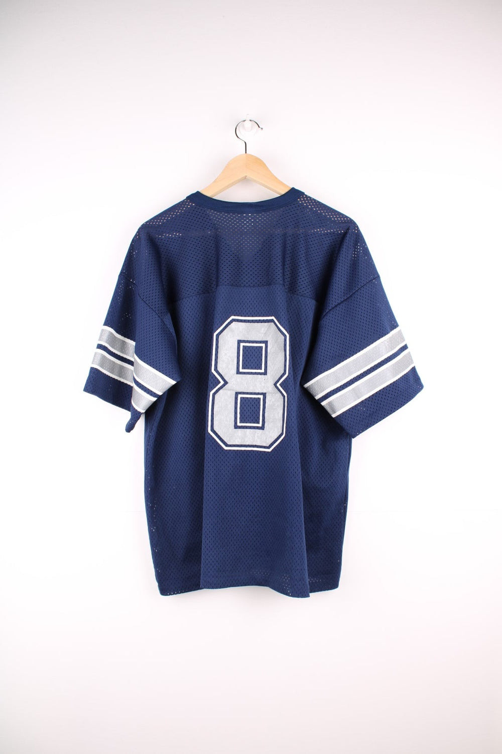 Dallas Cowboys Troy Aikman NFL jersey in blue with white and grey accents, an embroidered Logo 7 patch on the lower left side, and a number 8 printed on the front and back.