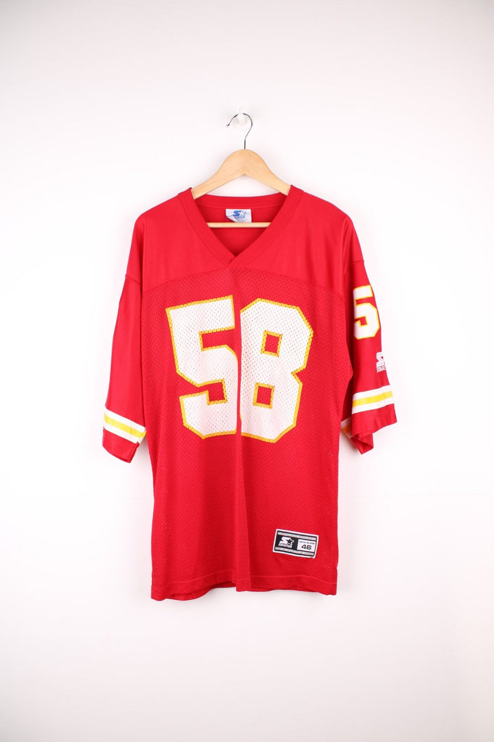 Kansas City Chiefs 58 Starter jersey in a red, white and yellow colourway. Features printed 58 on the front, back and sleeves, and embroidered starter logos.