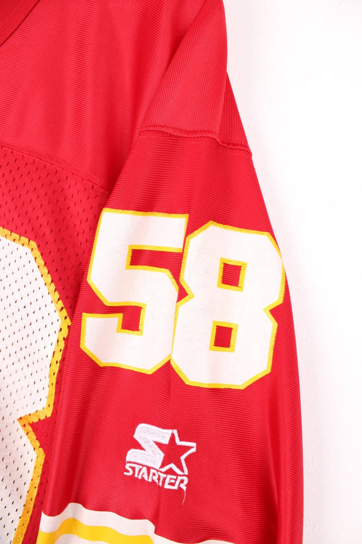 Kansas City Chiefs 58 Starter jersey in a red, white and yellow colourway. Features printed 58 on the front, back and sleeves, and embroidered starter logos.