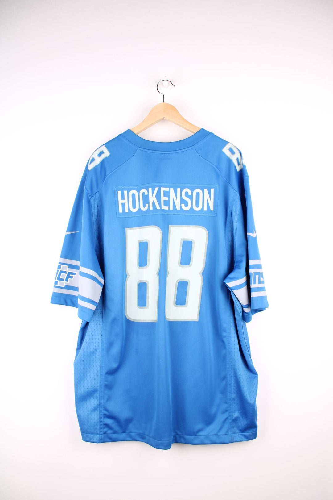 Nike Detroit Lions NFL Hockenson jersey in blue with grey accents, printed logos and 88 on the front and back. 