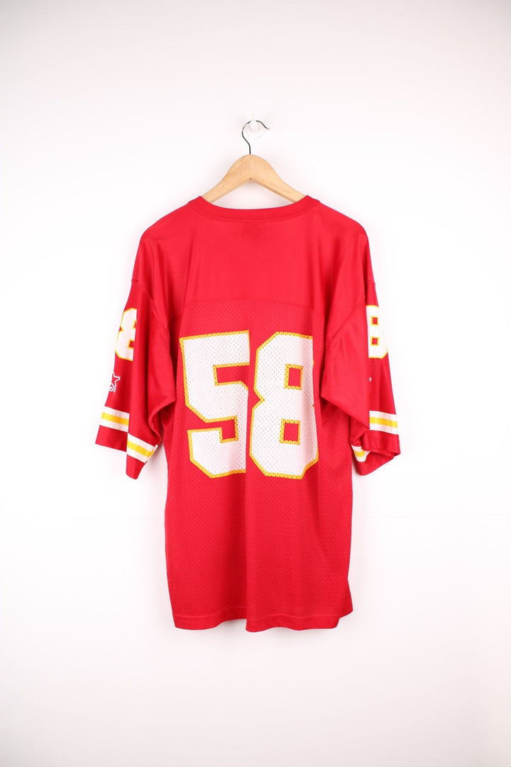 Kansas City Chiefs 58 Starter jersey in a red, white and yellow colourway. Features printed 58 on the front, back and sleeves, and embroidered starter logos.