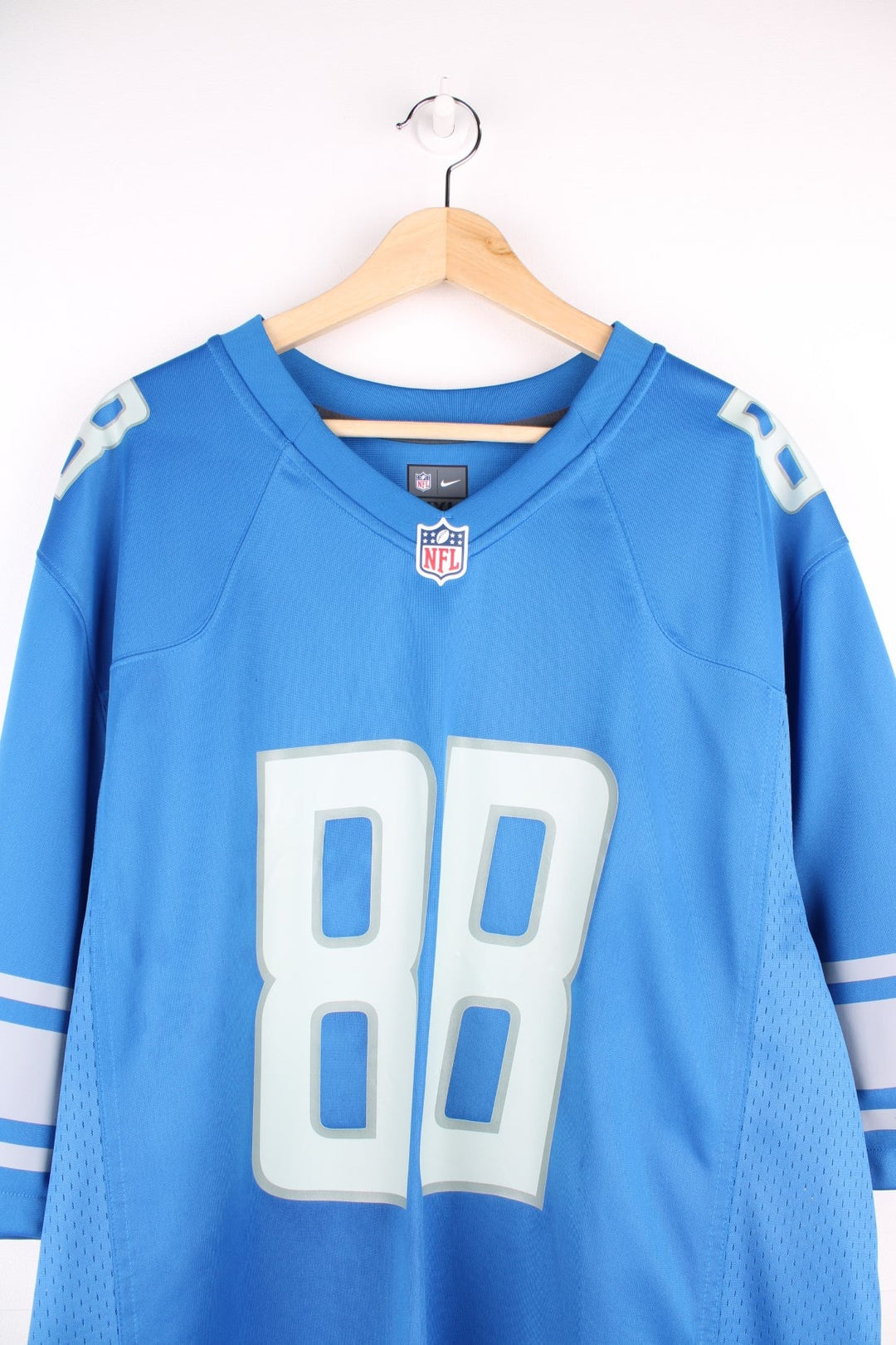 Nike Detroit Lions NFL Hockenson jersey in blue with grey accents, printed logos and 88 on the front and back. 