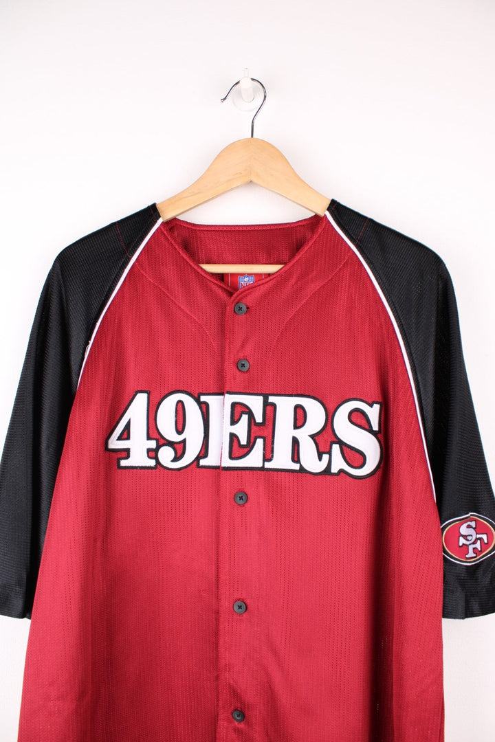 NFL San Francisco 49ers button up jersey in black and red with embroidered spell out logo across the front.