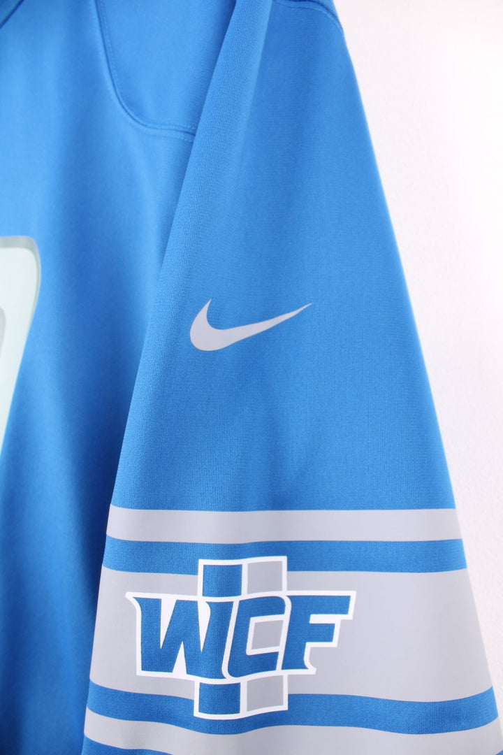 Nike Detroit Lions NFL Hockenson jersey in blue with grey accents, printed logos and 88 on the front and back. 