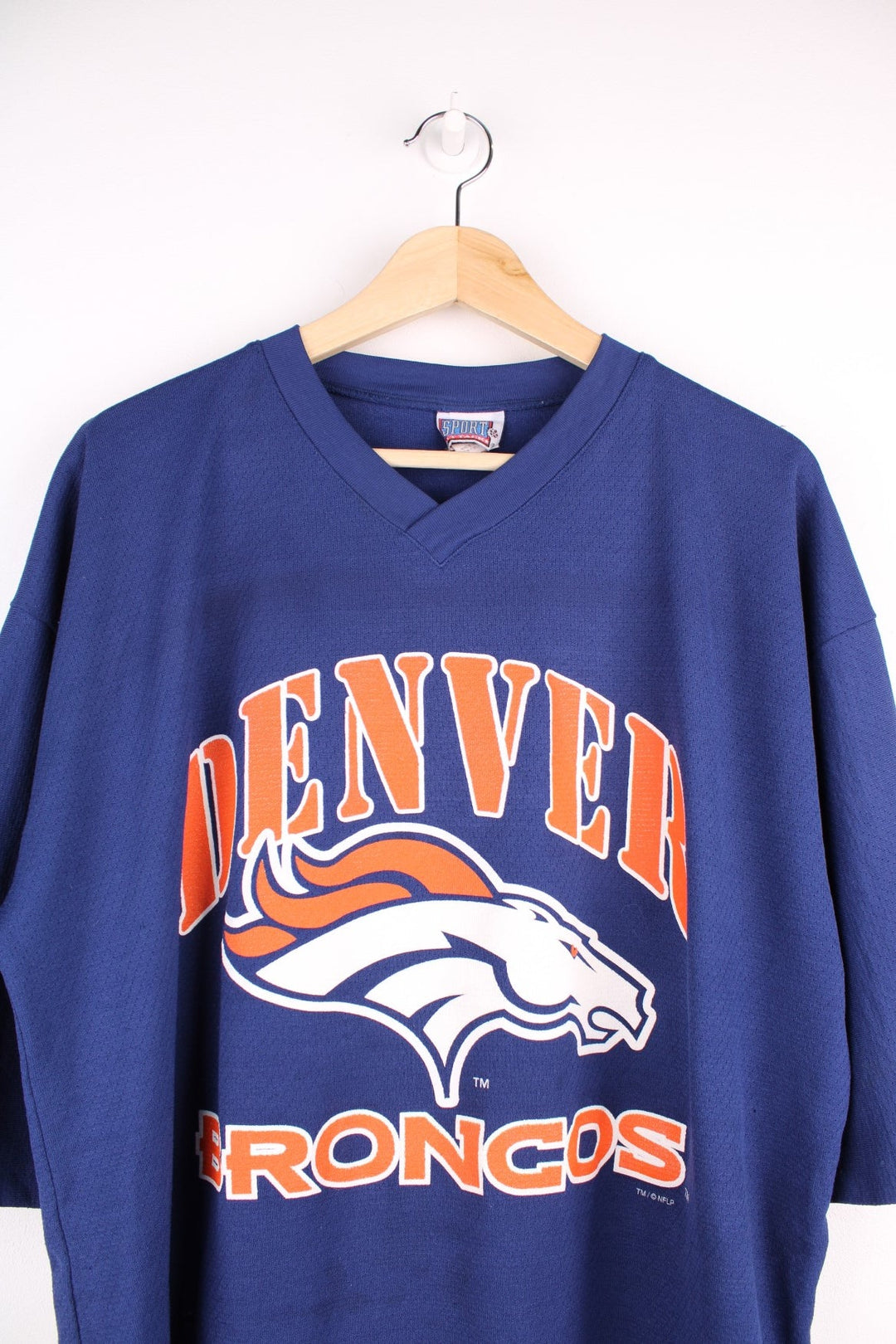 1998 Denver Broncos NFL jersey in blue with logo in orange on the front and no.30 Davis on the back.