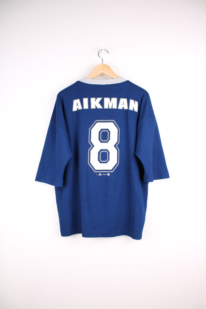 Dallas Cowboys NFL jersey in blue grey accents, logo design on the front, and no.8 Aikman on the back.