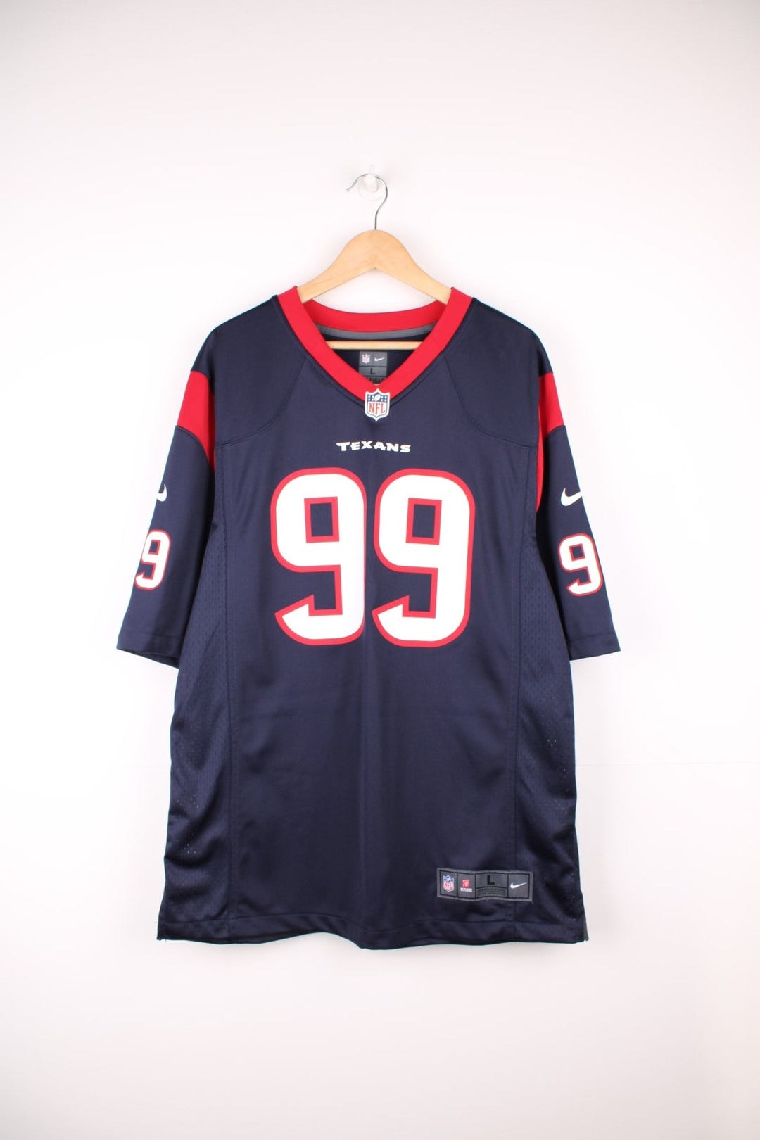 Houston Texans, Watt #99, Nike NFL jersey in a blue, red and white colourway. Features printed 99 on the front and back.