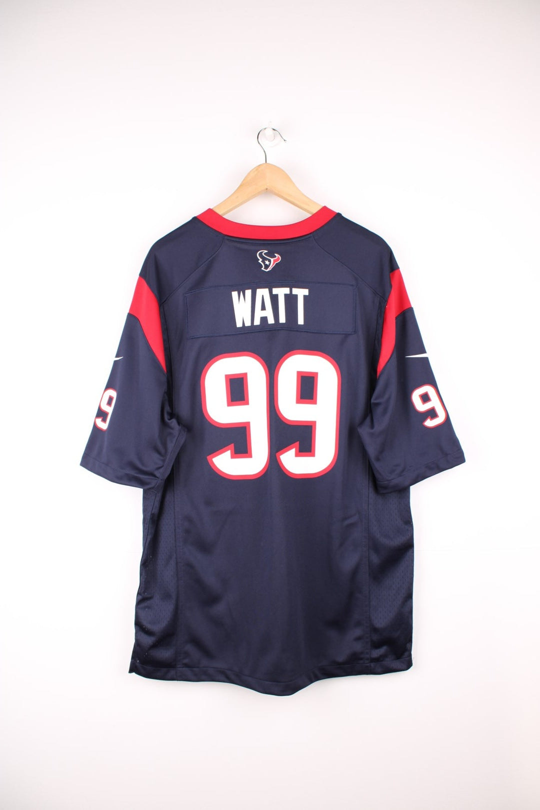 Houston Texans, Watt #99, Nike NFL jersey in a blue, red and white colourway. Features printed 99 on the front and back.