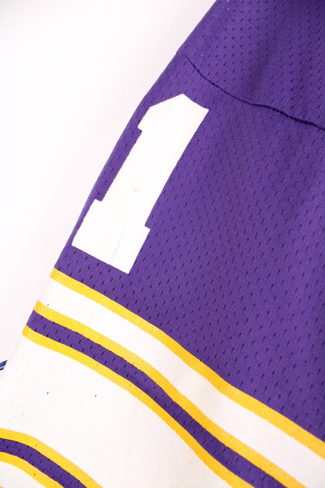  Champion Minnesota Vikings NFL jersey in purple with yellow and white accent stripes, an embroidered logo on the sleeve, and no.81 on the front, back and each sleeve.