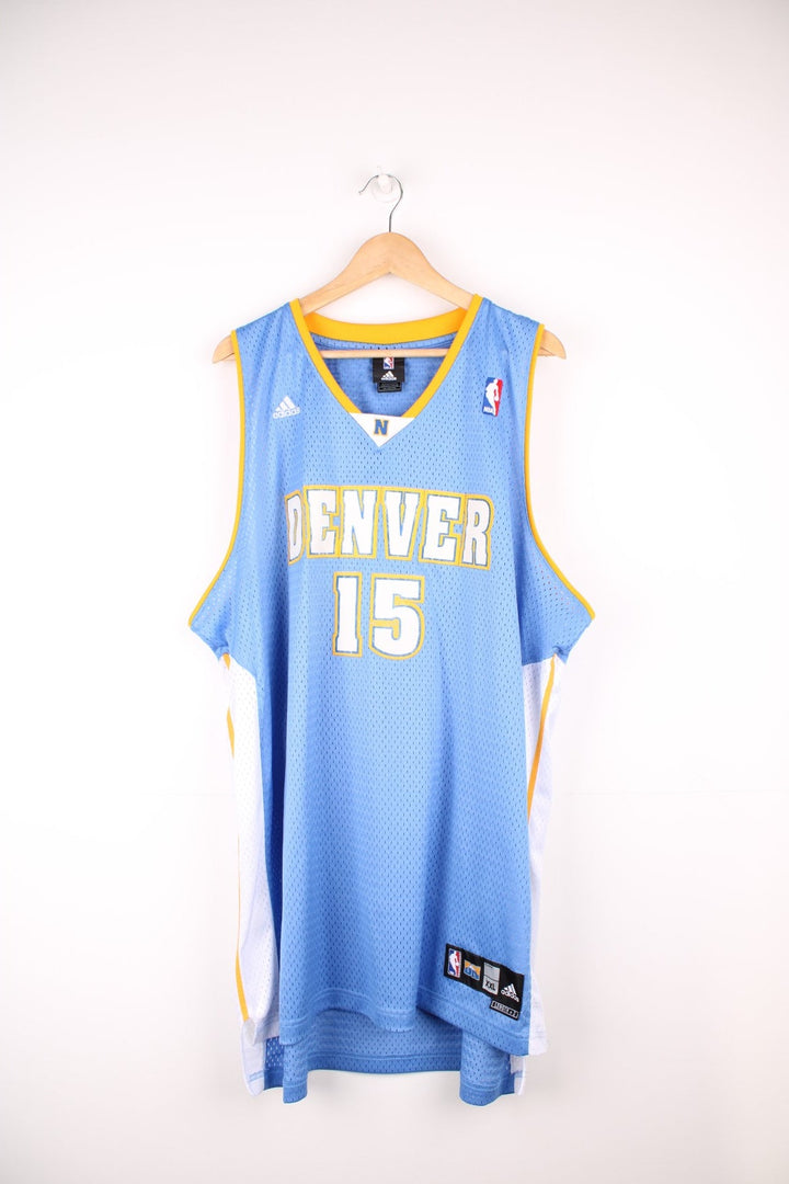 Denver Nuggets, Carmelo Anthony #15, Adidas NBA jersey in a blue, white and yellow colourway.